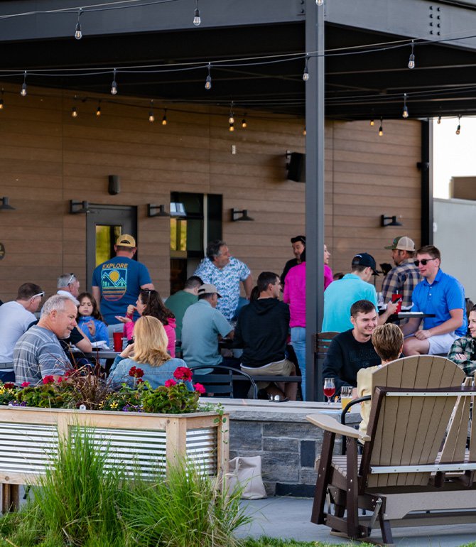 People dining outside at Darkbird Taphouse